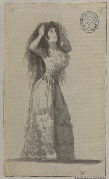 Mujer joven mesándose los cabellos